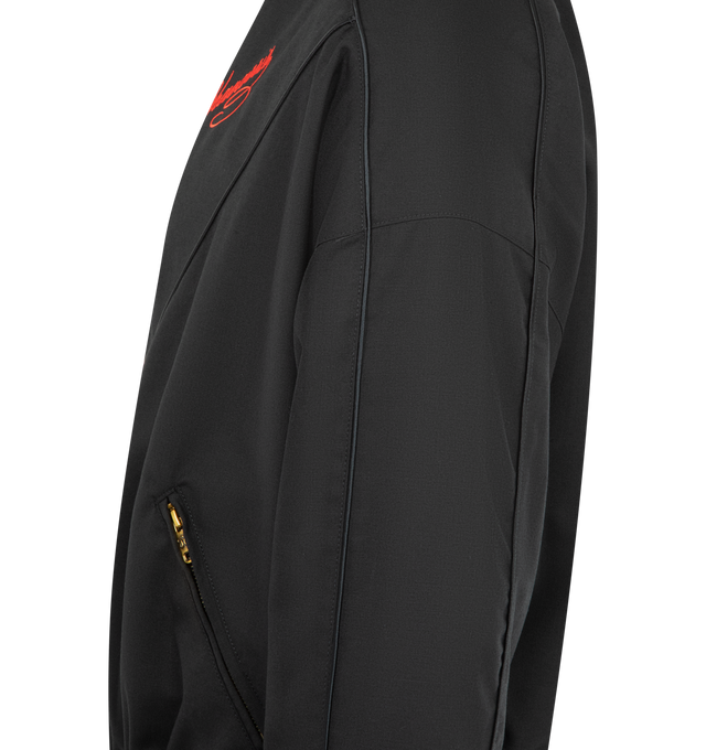 Image 3 of 3 - BLACK - WILLY CHAVARRIA Ruff Ryder Jacket featuring a nylon taffeta piped throughout, full lining, script inspired logo, stand collar, zip closure, zip pockets and elasticated trims. 100% nylon. Made in the USA.