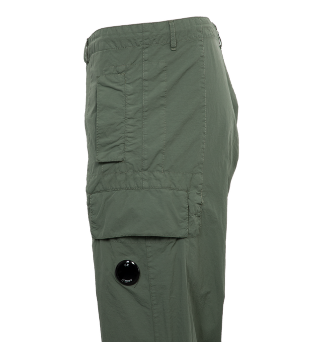 Image 3 of 4 - GREEN - C.P. COMPANY Flatt Nylon Oversized Cargo Pants featuring oversized fit, zip fly and button fastening, belt loops, slanted hand pockets, cargo pockets and lens detail. 100% polyamide/nylon. 