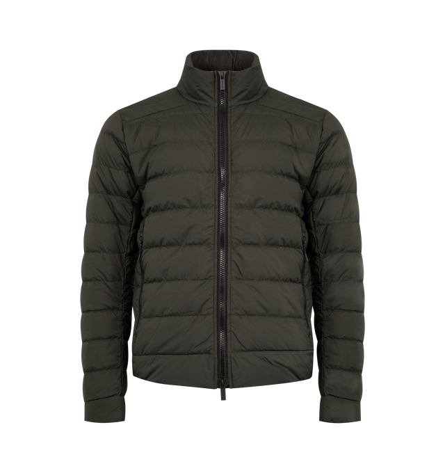 Image 1 of 3 - BROWN - CANADA GOOSE Crofton EnduraLuxe Jacket featuring two-way zipper, packable into interior left pocket, converts into a cinchable bag with a carrying strap, removable interior backpack straps for hands-free carrying capabilities, interior drawcord at hem, two exterior tricot-lined zippered hand pockets and one interior drop-in pocket. 100% recycled polyamide. Made in Canada.