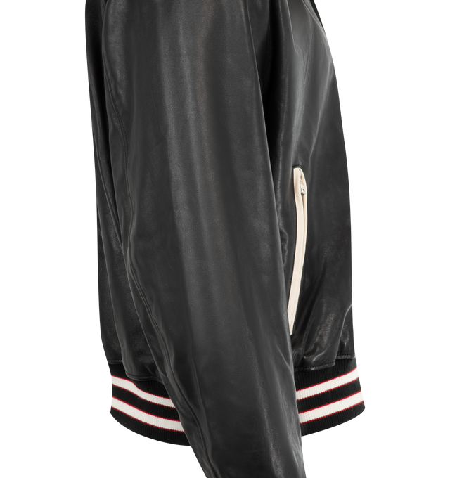 Image 3 of 3 - BLACK - AMIRI Club Amiri Leather Varsity Jacket featuring welt zipper pockets, snap button closure, and banded rib finishes. 100% leather. Lining: 100% viscose.