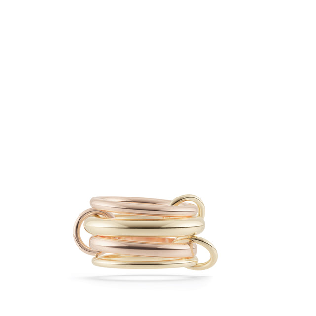 Image 1 of 1 - MULTI - SPINELLI KILCOLLIN Rain 4 Linked Rings featuring rose and yellow gold rings and 4 linked rings in 18K yellow and rose gold with mixed gold connectors. For personal consultation and detailed information about jewelry, please contact our dedicated stylist team at personalshopping@hirshleifers.com.