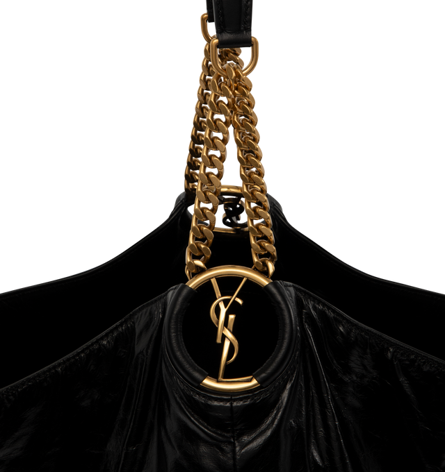Image 3 of 4 - BLACK - Saint Laurent Womens Hobo Bag is crafted from lustrous calfskin leather. Features a slouchy silhouette, signature Cassandre ring detail, shoulder strap, magnetic closure, removable zip pouch, suede lining, and bronze-tone hardware. Main Material: Calfskin Leather; Lining: Suede; Hardware: Brass. Made in Italy.