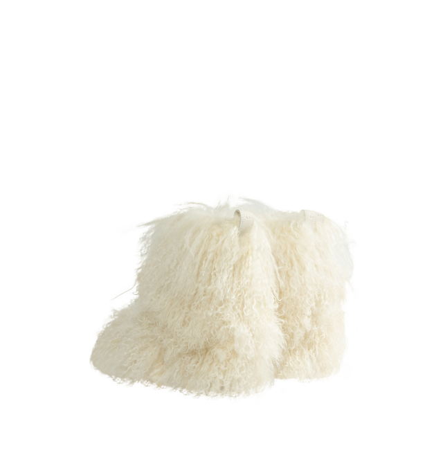 Image 3 of 4 - WHITE - UGG Women's Classic Short Fluff Momma Boot is crafted from long sheepskin and features a statement short-boot silhouette, an 8-inch shaft, and a rear pull tab. Designed with plush UGGplush lining and sockliner for comfort and warmth, this style is finished with a lightweight sugarcane EVA outsole and recycled polyester textile binding. Main Material: Long Sheepskin. Vamp Lining: 17mm UGGplush (60% Upcycled Wool, 40% TENCEL Lyocell). Shaft Lining: Textile. Sockliner: 17mm UGGplush (60%