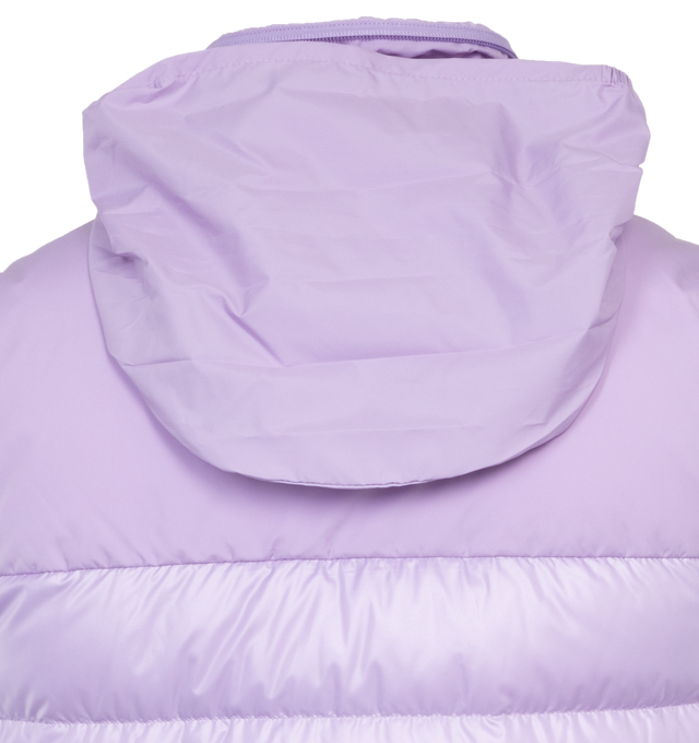 Image 4 of 5 - PURPLE - MONCLER Cerces Down Vest featuring stowaway hood at stand collar, two-way zip closure, felted logo patch at chest, zip pockets, elasticized hem, zip pocket at interior, fully lined and logo-engraved silver-tone hardware. 100% polyester. Fill: 90% duck down, 10% feathers. 