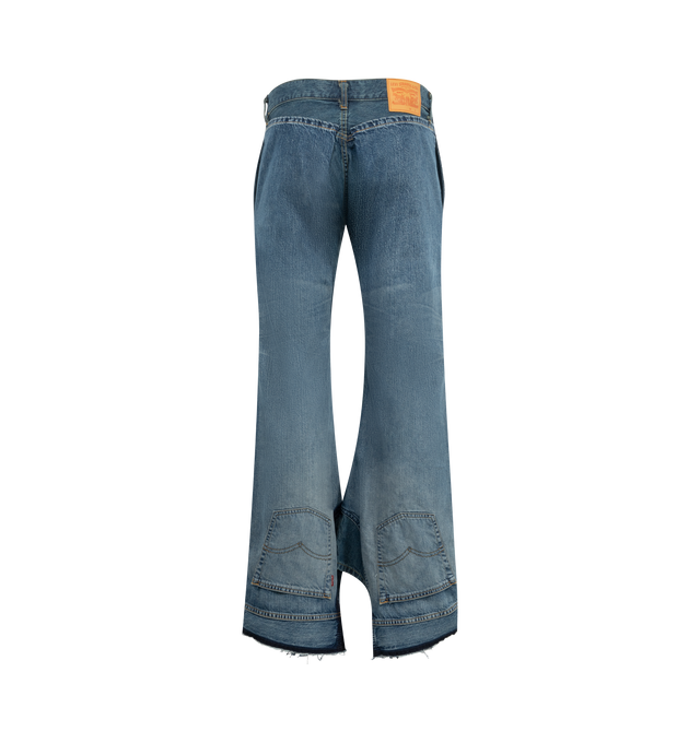 Image 2 of 3 - BLUE - JUNYA WATANABE Deconstructed Wide Leg Jeans featuring a deconstructed design with an asymmetric double waistband, unconventional hem includes repurposed pockets and a side split, mid rise, full length, wide legs, button and zip fly and belt loops. 100% cotton. Made in Japan.