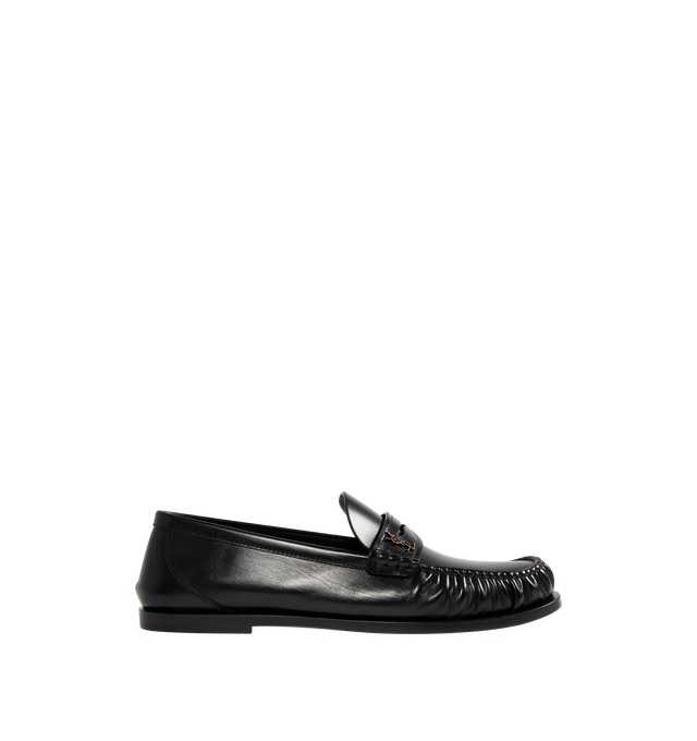 Image 1 of 4 - BLACK - SAINT LAURENT Ryan 05 Penny Loafers in leather featuring stacked heel, round moc toe, penny keeper strap with Cassandre hardware, leather outsole and slip-on style. Made in Italy.