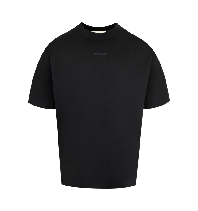 Image 1 of 2 - BLACK - FEAR OF GOD ESSENTIALS Classic Tee is made from medium-weight 100% cotton jersey featuring rib-knit crewneck, classic fit with signature Fear of God relaxed proportions, branding includes a Fear of God Essentials translucent rubberized label at the center front and a new "Essentials Fear of God" beveled metallic logo across the back. 100% cotton.