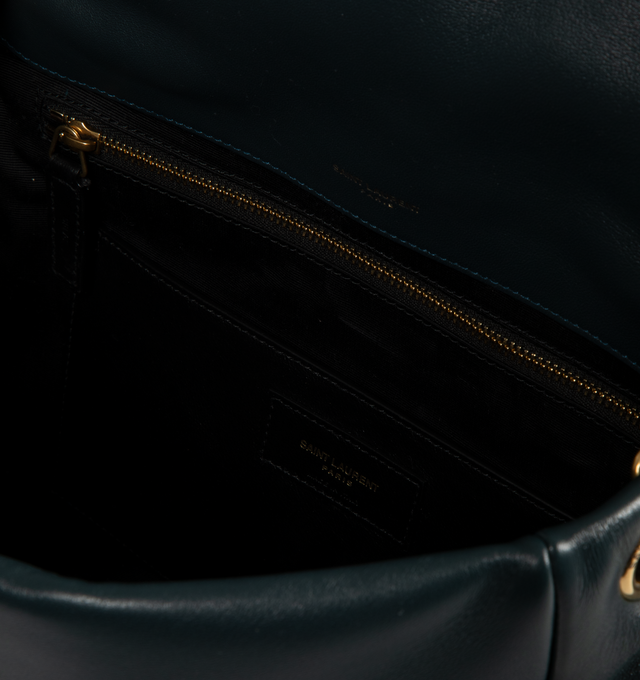 Image 4 of 4 - GREEN - Saint Laurent Medium Jamie 4.3 bag crafted from soft nappa lambskin leather decorated with carre rive gauche quilted top-stitching. This lightweight, compact bag features an adjustable sliding strap for bespoke carry options, organic cotton lining, bronze-toned hardware and flap closure. Measures 11.4" inches wide x 8.3 inches high x 23.5 inches deep with 1119.7 inch strap drop. Made in Italy.