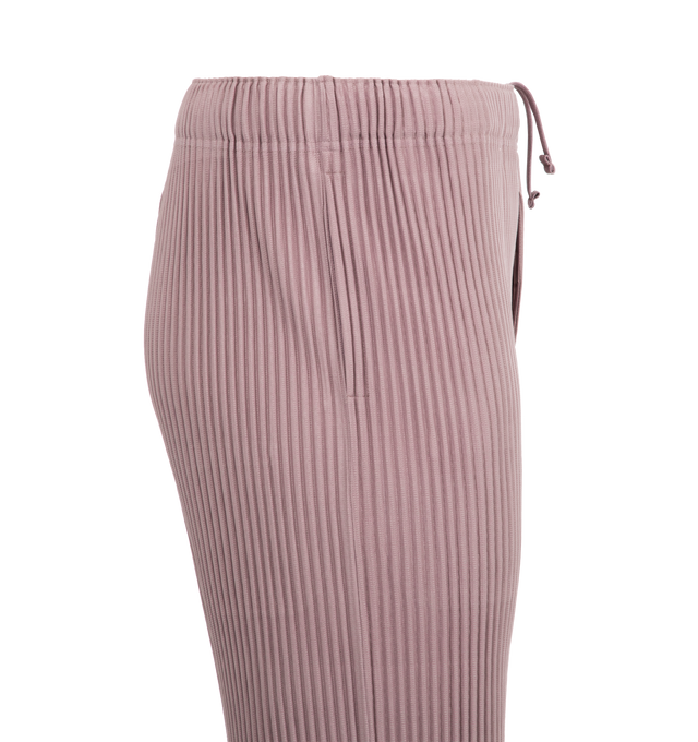 Image 4 of 4 - PINK - ISSEY MIYAKE Pleat Shorts featuring pockets on both sides, draw cord at the waist and a button-fly design. 100% polyester. Made in Japan.