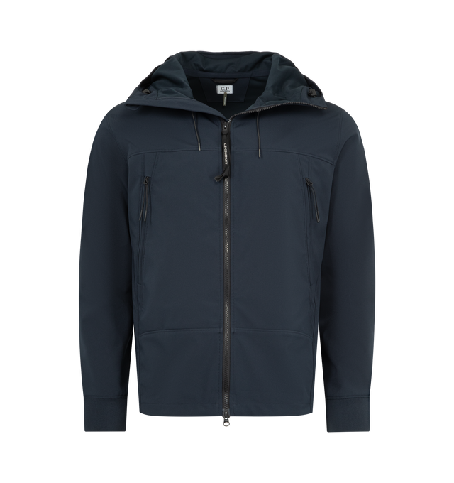 Image 1 of 4 - NAVY - C.P. COMPANY C.P. Shell-R Goggle Jacket featuring adjustable Goggle hood, two-way full zip fastening, side zip pockets, elasticated cuffs, adjustable drawstring hem and regular fit. 92% polyester, 8% elastane/spandex.
