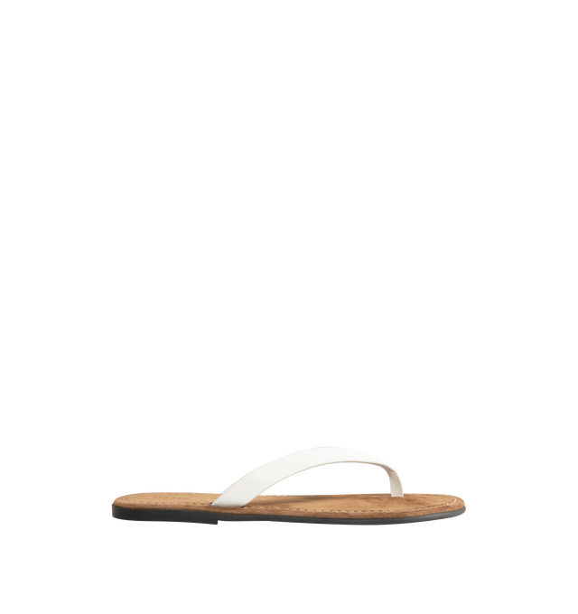 Image 1 of 4 - WHITE - THE ROW Beach Flip Flop featuring vegetable-tanned calfskin leather with seamless strap, padded goatskin insole and rubber sole. 100% calfskin leather. Synthetic sole. Made in Italy.