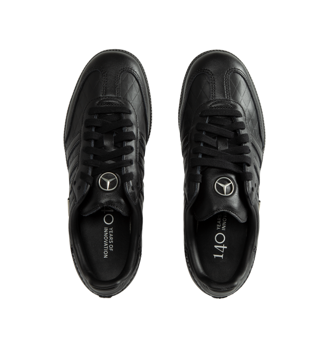 Image 5 of 5 - BLACK - Adidas Men's Samba OG Mercedes-Benz Shoes are crafted from premium leather and feature the iconic Samba silhouette with signature Mercedes-Benz branding and serrated 3-Stripes. Designed with a smooth leather lining for enhanced comfort and a durable rubber outsole for everyday traction, this collaborative style blends heritage sport design with automotive-inspired detailing. Main Material: Premium Leather. Lining: Leather. Outsole: Rubber.