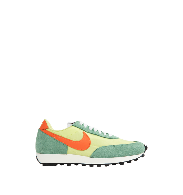 Image 1 of 5 - GREEN - Nike Men's Daybreak running shoe, inspired by colors from the '70s running boom era, combining breathable mesh and shaggy suede with a vintage Waffle outsole. Electro Orange accents radiate against the smooth Limelight and Healing Jade colorway. Calf Suede and fabric with rubber sole.