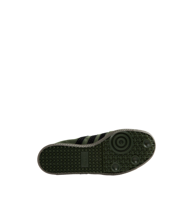 Image 4 of 5 - GREEN - Adidas Originals Men's Samba OG SFTM Shoes are crafted from premium leather and feature a classic low-profile silhouette with lace-up fastening and signature Samba styling. Designed with a smooth textile and synthetic lining for comfort and a durable rubber outsole for everyday traction, this versatile sneaker blends timeless sport heritage with contemporary appeal. Main Material: Leather Upper. Lining: Textile and Synthetic Materials. Outsole: Rubber.