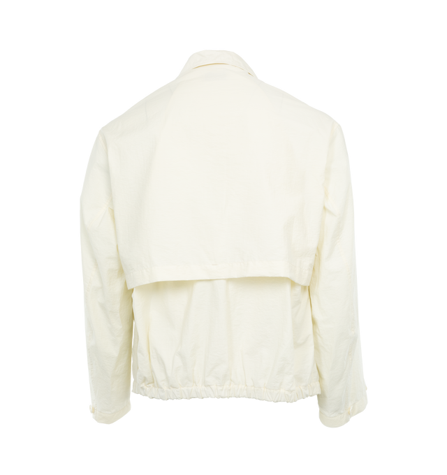 Image 2 of 6 - WHITE - LEMAIRE Light Field Jacket featuring relaxed fit, workwear collar, four 3D pockets, buttoned tabs at the cuffs, back yoke, corozo buttons, bottom of the jacket is elasticated in the back and unlined. 84% cotton, 16% polyamide. 