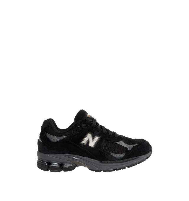 Image 1 of 5 - BLACK - NEW BALANCE 2002DX Sneaker featuring soft French terry fabric, ABZORB midsole, ABZORB SBS heel cushioning, N-ergy technology for superior shock absorption, atability Web outsole technology and GORE-TEX waterproof fabric.