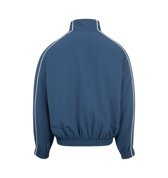 Image 2 of 3 - BLUE - WILLY CHAVARRIA Bad Boy Track Jacket featuring front zipper closure, side slant pockets with zipper closer, logo detail on left side of chest and elastic at waist. 100% nylon. Made in USA.