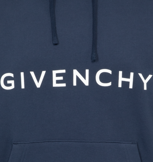 Image 3 of 3 - NAVY - GIVENCHY BOXY FIT HOODIE WITH POCKET BASE featuring drawstring at hood, logo printed at chest, kangaroo pocket, rib knit hem and cuffs and star graphic at hem. 100% cotton. Made in Portugal. 