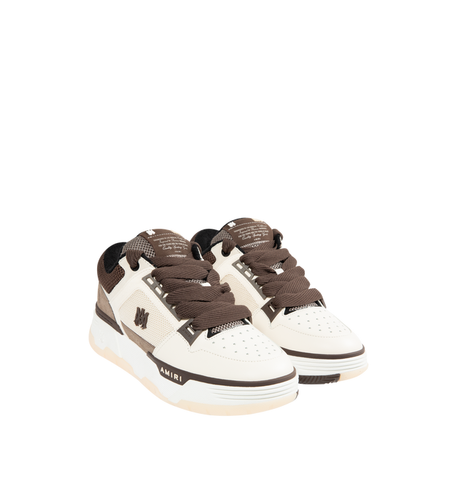 Image 2 of 5 - BROWN - AMIRI MA-1 Sneakers featuring low-top buffed leather and mesh sneakers, graphic perforations at toe, lace-up closure, logo patch at padded tongue, padded collar, logo embossed at heel counter, perforations and logo hardware at sides, terrycloth lining, logo graphic embossed at textured rubber midsole and treaded rubber sole. Upper: leather, textile. Sole: rubber.