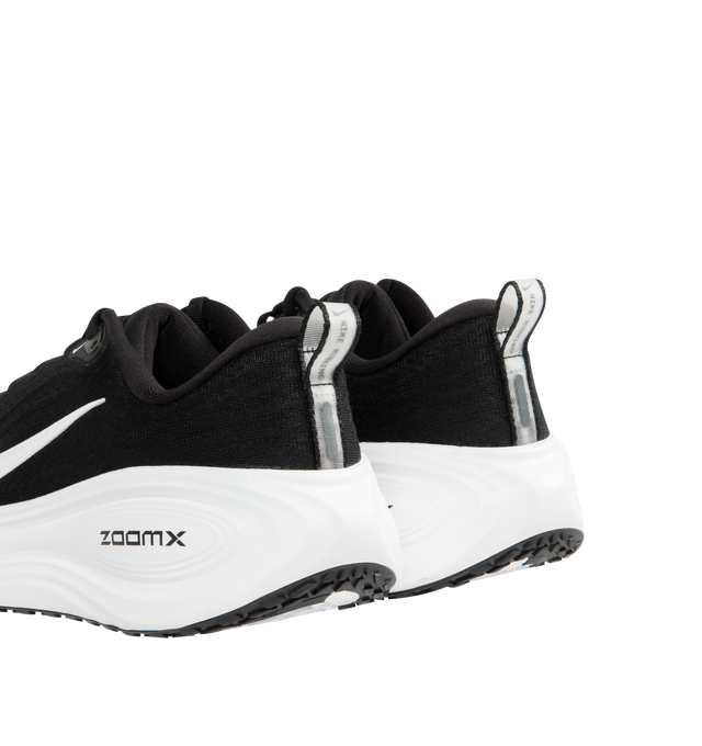 Image 3 of 5 - BLACK - NIKE Vomero Plus Sneaker featuring a stack of full-length ZoomX foam, engineered mesh upper, ZoomX foam midsole, durable traction, high-abrasion rubber outsole, webbed lace loops for an adjustable fit and reflective design details.