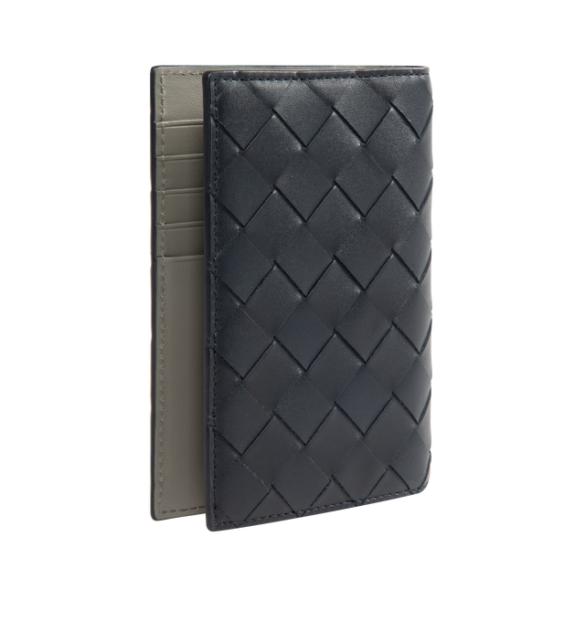 Image 2 of 3 - BLACK - BOTTEGA VENETA Intrecciato Passport Case featuring intrecciato calfskin leather with contrasted interior, five card slots, two additional pockets. Calfskin. 5.2" x 3.7" x 0.2". Made in Italy.