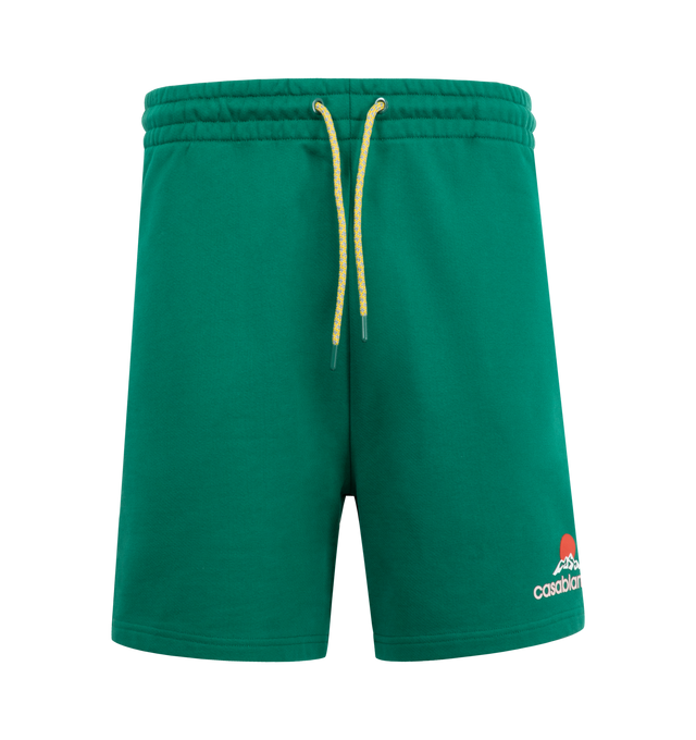 Image 1 of 3 - GREEN - CASABLANCA Montagne Sweat Shorts featuring organic cotton French terry, drawstring at elasticized waistband, three-pocket styling and logo graphic bonded at front hem. 100% organic cotton. Made in Portugal.