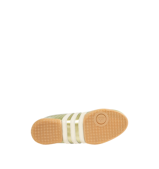 Image 4 of 5 - GOLD - ADIDAS Taekwondo Mei Elite Sneaker featuring regular fit, synthetic and leather upper, textile and leather sockliner, rubber outsole, asymmetric lacing, decorative stitching on the toe and stripes wrapped around the outsole.