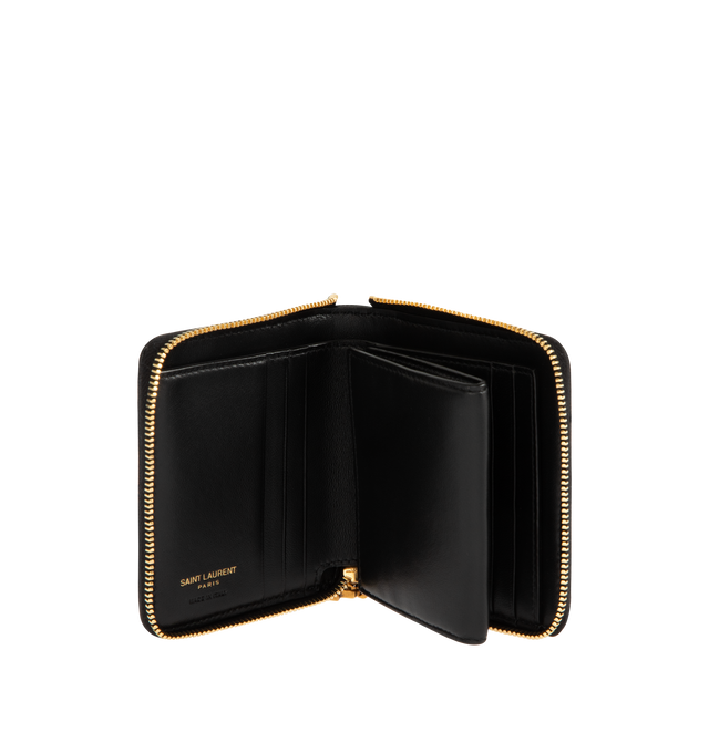 Image 3 of 3 - BLACK - SAINT LAURENT Bijou Compact Wallet in grain de poudre leather featuring zip around closure with CASSANDRE jewelry zip pull, diamond-quilted topstitching, gold-tone hardware, six card slots, one bill compartment and one coin compartment. 4.1" x 3.5" x 0.8". Calfskin. Made in Italy.