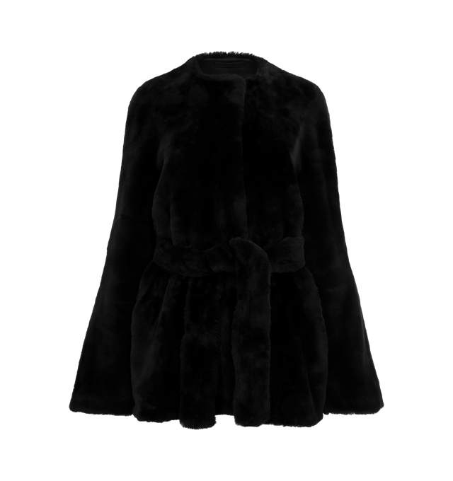 Image 1 of 3 - BLACK - TOTEME Plush Shearling Jacket featuring plush shearling with a suede reverse, slip pockets, hip-length, straight silhouette closing with a detachable belt and internal hooks. 100% lamb leather.