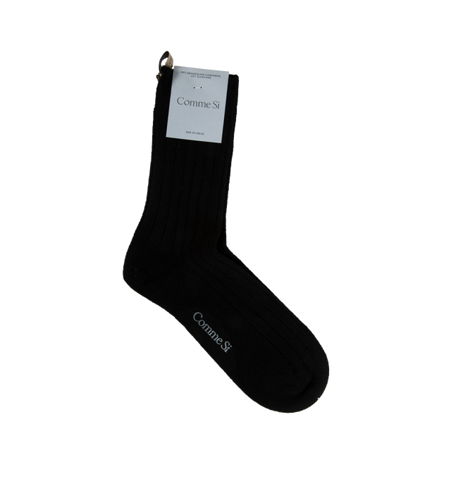 Image 1 of 1 - BLACK - COMME SI Soft, medium-weight sock made in Italy from luxurious Mongolian cashmere. Features a wide rib and crew length that hits mid-calf for a flattering fit.  90% ethically sourced Mongolian cashmere + 10% elastane. Reinforced toe.Finished by hand with decorative logo ribbon.  