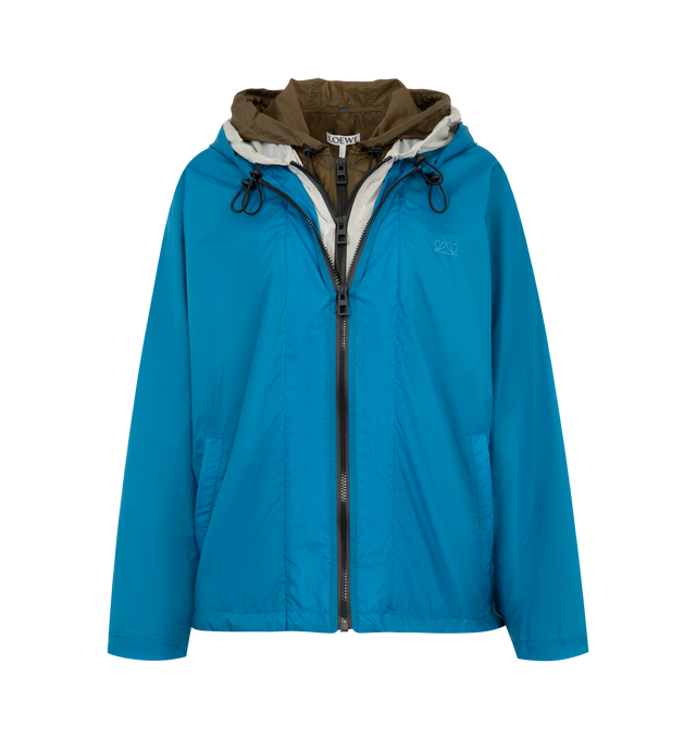 Image 1 of 3 - BLUE - Loewe Womens Technical Jacket is crafted from lightweight technical shell with a triple-layer construction. Features a relaxed fit, regular length, zip-up neckline with hood, front welt pockets, elasticated hem with drawstring, and Double L embroidery at the chest. Main Material: Polyamide / Polyurethane. Made in Italy.