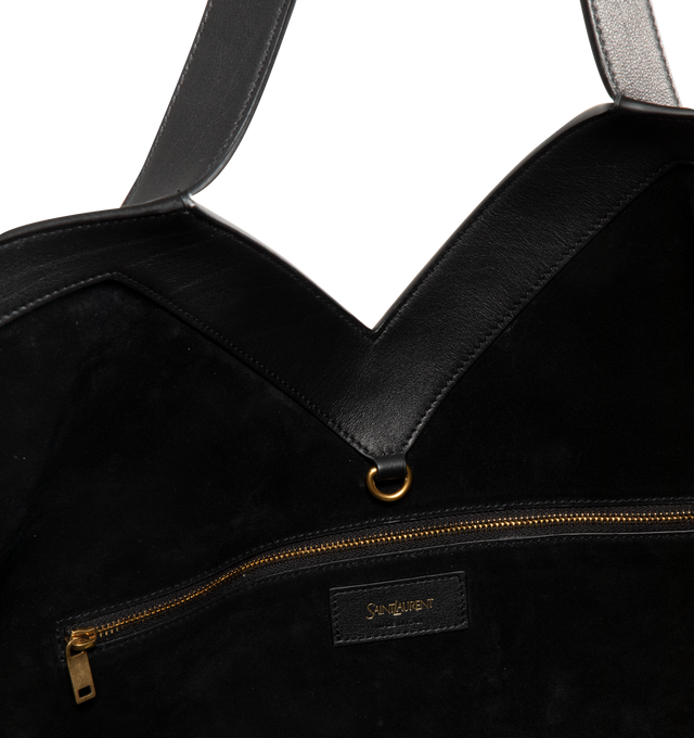 Image 3 of 3 - BLACK - SAINT LAURENT Y Tote Bag featuring finely grained leather, lined in tonal suede, subtle Y stitched signature, inner zip pocket and hook closure and bronze-toned hardware. 14.6 " x 12.6" x 2.88.7". Strap drop: 10.2". Calfskin leather. Made in Italy.