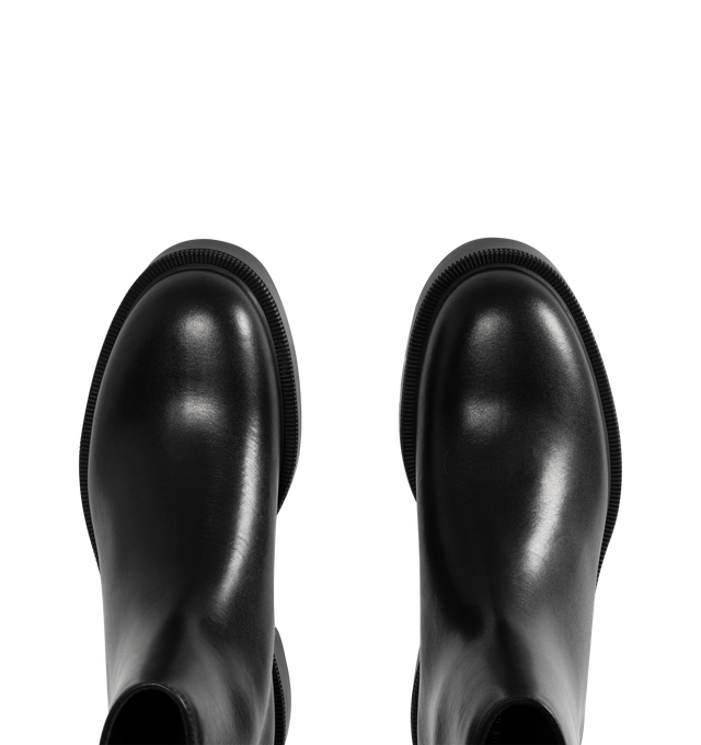 Image 4 of 4 - BLACK - THE ROW Nobilis Fast Boot featuring versatile ankle boot in polished calfskin leather with round toe, back zipper closure and treaded rubber platform sole. 100% calfskin leather. Synthetic sole. Made in Italy.