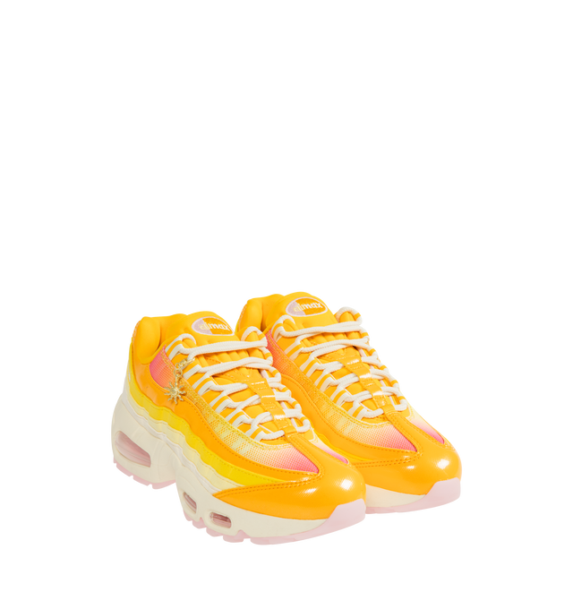 Image 2 of 5 - YELLOW - NIKE Air Max 95 Big Bubble Sneaker featuring distinctive wavy design, textile and synthetic leather, visible Max Air cushioning, flex grooves in the midsole and outsole, foam midsole and rubber outsole.