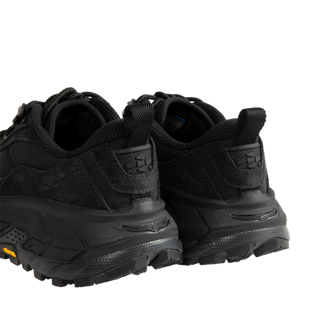 Image 3 of 5 - BLACK - Hoka Unisex Tor Summit FLD Sneakers are crafted from premium nubuck leather and feature a rugged outdoor-inspired silhouette. Designed with metal eyelets, a rubber mud guard, and a secondary lace system for enhanced functionality, they are finished with a Vibram Megagrip outsole for reliable traction. Main Material: Leather and Textile. Sole: Rubber. *Unisex style in men's sizing.