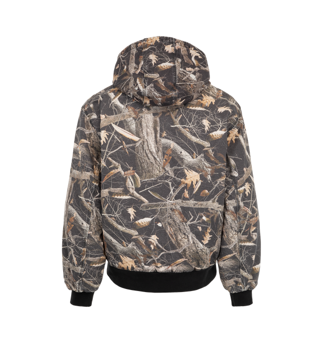 Image 2 of 3 - MULTI - Carhartt WIP Men's OG Active Jacket is crafted from heavyweight Dearborn canvas and features this season's allover Camo Feather Tree print, an adjustable hood, and a front zip closure. Designed in the brand's original loose fit, it is detailed with a diamond-quilted lining, kangaroo pocket, inside chest pocket, rib-knit cuffs and hem, triple-stitched construction, and a woven Square Label. Main Material: 100% Organic Cotton Dearborn Canvas.