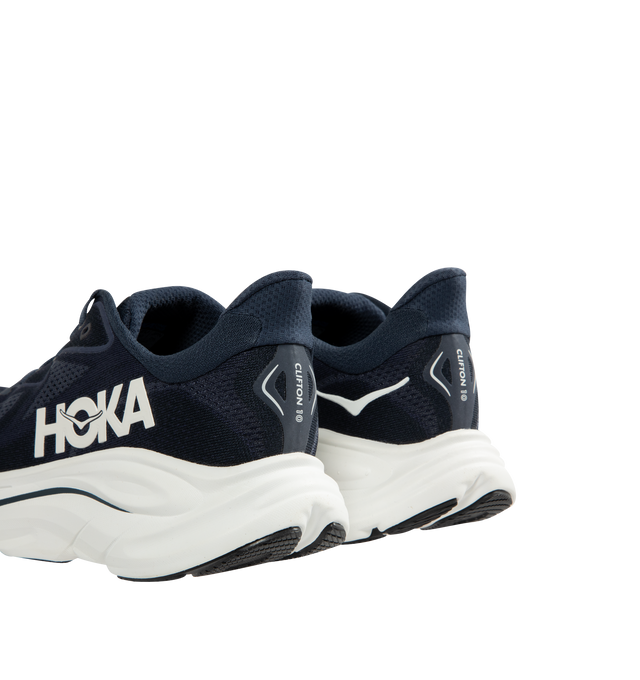 Image 3 of 5 - NAVY - HOKA Clifton 10 Sneaker featuring jacquard knit, reflective upper details, smooth MetaRocker, rearfoot-focused Active Foot Frame, CMEVA midsole, molded EVA sockliner and inherently durable abrasion rubber.