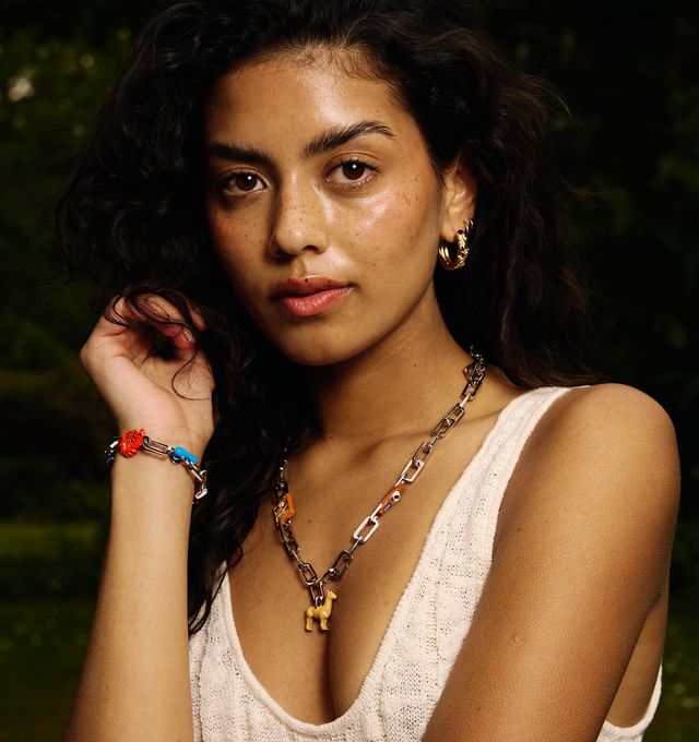 Image 3 of 8 - SILVER - Poubel by The Gstaad Guy Necklace Links composed of 43 interchangeable sterling silver links, acting as a canvas for your Poubel charms. Poubel links are made with recycled, rhodium plated, sterling silver, comprised of 92.5% pure silver and 7.5% other metals. The addition of other metals makes our links more durable, without compromising colour or shine. Circumference: 50 cm. Size: one size fits all, as links can be independently added or removed. Charms and pendants sold separatel