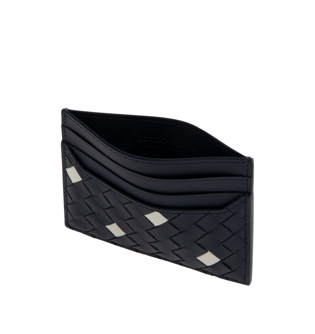 Image 3 of 3 - BLUE - BOTTEGA VENETA Intrecciato Piccolo Card Case featuring calf leather card case with polka dots, four card slots and one central pocket. The VN Preserve calf leather is realized through the BioBasedLeather process, which ensures a limited presence of petrol-based components and exclusive reliance on renewable energy sources. Calfskin. 3.1" x 4.1" x 0.2". Made in Italy.