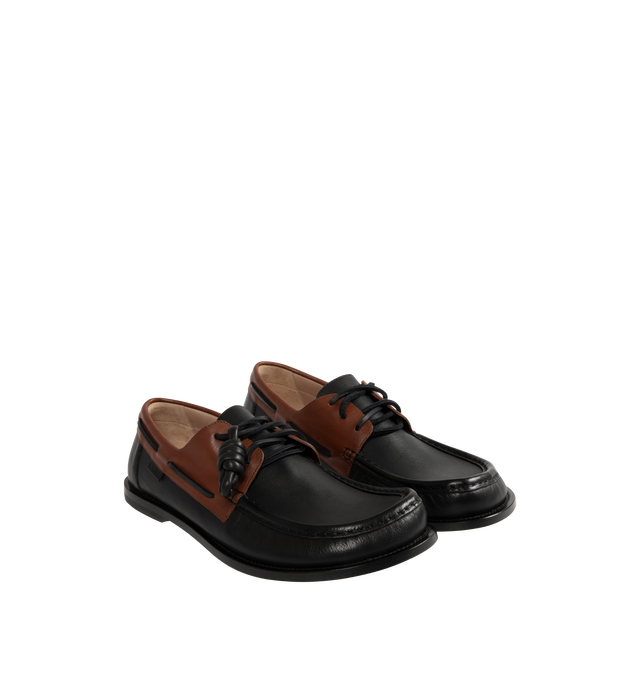 Image 2 of 4 - BROWN - Loewe Men's Campo Boat shoe in two-tone soft calfskin featuring the LOEWE signature round toe shape and a hand-sewn construction with a supple leather lining and flexible sole. Features 20mm heel, squared leather lace closure, padded leather insole, rubber-injected leather outsole, removable Flamenco knot and LOEWE embossed tag placed at the side. Made in Italy.