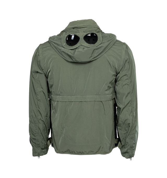 Image 2 of 7 - GREEN - C.P. COMPANY Chrome-R Goggle Utility Jacket featuring acetate lenses with press-stud fastening at detachable hood, bungee-style drawstring at hood and hem, two-way zip closure wit press-stud placket, flap pockets, seam pockets and adjustable press-stud fastening at cuffs. 100% recycled polyamide. Lining: 100% cotton. Made in China. 