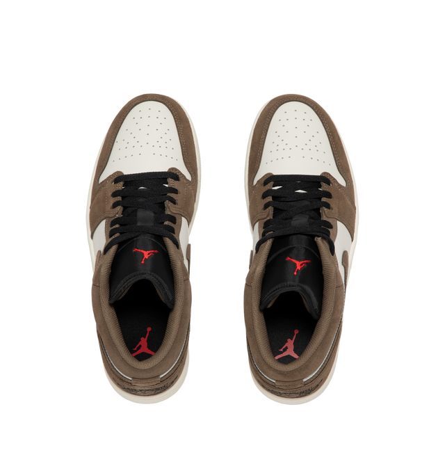 Image 5 of 5 - BROWN - Air Jordan 1 Low Sneakers feature a genuine leather & suede upper with the iconic low-top silhouette for a clean, timeless heritage look. These lifestyle sneakers combine encapsulated Air-Sole cushioning with a durable rubber outsole for lightweight comfort, lasting support, and reliable everyday traction. Main Material: Genuine Leather. Midsole: Encapsulated Air-Sole Unit. Sole: Rubber.