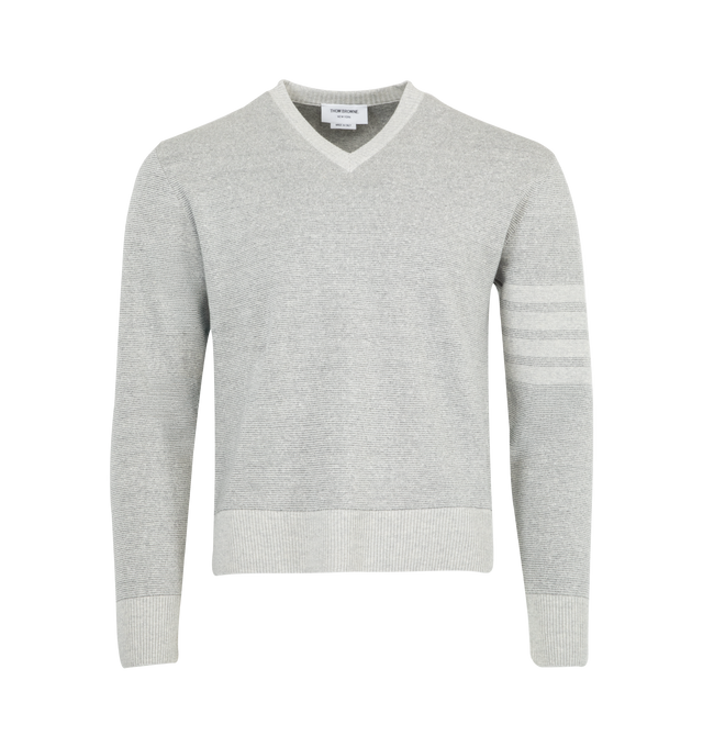 Image 1 of 2 - GREY - THOM BROWNE V-Neck Pullover featuring v neckline, tonal 4 bar on sleeve, relaxed fit, ribbed collar cuffs and hem and grosgrain loop tab. Made in Italy.