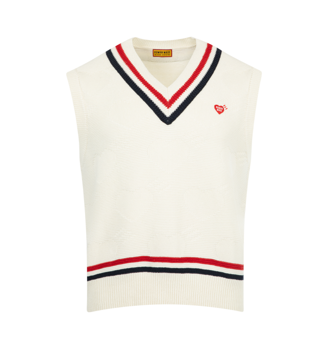 Image 1 of 2 - WHITE - HUMAN MADE Heart Knit Vest featuring school-inspired knit vest with an interwoven heart motif design, v neck and striped trim. 86% linen, 14% polyester.