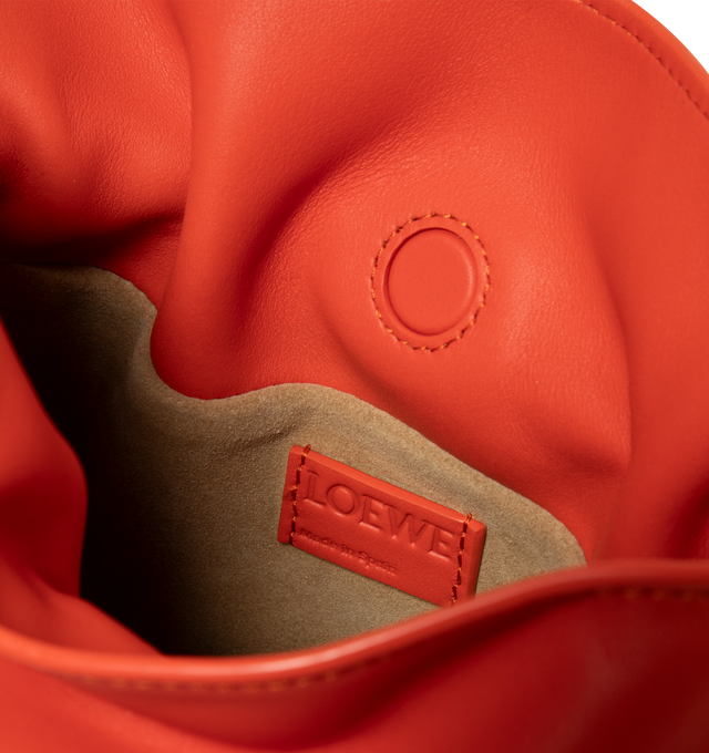 Image 3 of 3 - ORANGE - LOEWE Mini Flamenco Clutch in nappa calfskin featuring a soft and slouchy bag with a cinched closure and historical knot drawstrings, shoulder, crossbody or hand carry, detachable and adjustable strap, discreet magnetic closure, suede lining and embossed Anagram. Nappa calf. 18 cm x 23.9 cm x 9 cm. Made in Spain.