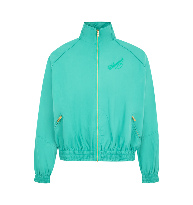 Image 1 of 2 - GREEN - WILLY CHAVARRIA Ruff Rider Track Jacket featuring script logo on the front chest, stand collar, golden zip front, long dolman sleeves with elasticized cuffs, side zip pockets, elasticized hem and relaxed cut. Cotton. Made in USA.