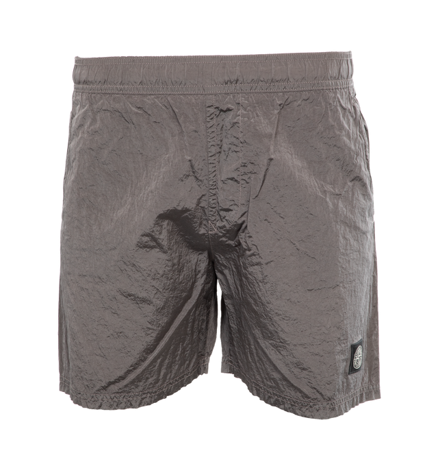Image 1 of 4 - GREY - STONE ISLAND Swimming Trunks featuring regular fit, slanting hand pockets, one back pocket with hidden zipper closure, Stone Island Compass patch logo on the left leg, inner mesh and elasticized waistband with inner drawstring. 100% polyamide/nylon. 