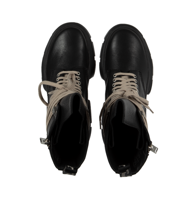 Image 4 of 4 - BLACK - DR. MARTENS X RICK OWENS 1918 calf-length DXML boot in black cow leather featuring exaggerated length pearl-tone laces and palladium finish hardware including eyelets, speed hooks and side zipper, an extended geometric tounge and woven Dr. Martens Airware heel loop. 50% E.V.A + 50% Polivinilclorurol rubber sole with Dr. Martens yellow welt stitch. DXML outsole, an exaggerated interperetation of the classic Dr. Martens sole.   * COLOR: BLACK * UPPER: UPPER 100% COW LEATHER* LEG LINING: 