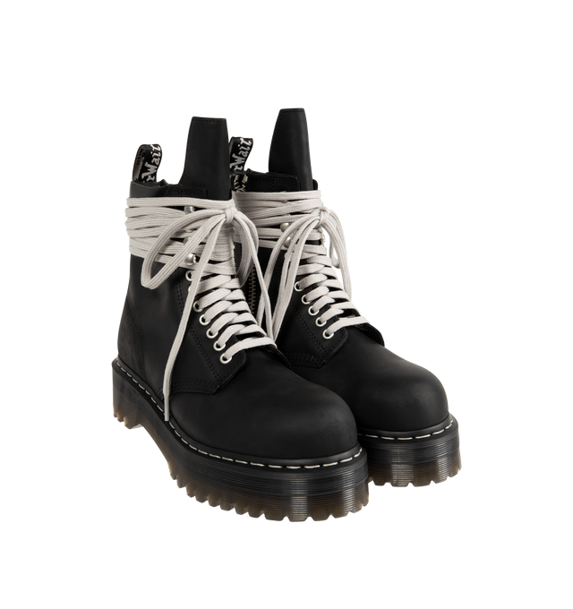Image 2 of 4 - BLACK - RICK OWENS X DR. MARTENS Steel Toe Quad Platform Boot featuring waxy Republic leather with a padded collar detail, hardened with a steel toe cap, classic eyelets and speed hooks with the exaggerated wraparound laces, easy-access inner ankle zip, extra height Quad sole with pure white welt stitch and a special edition heel loop.