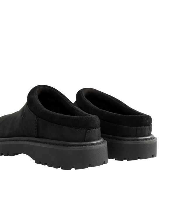 Image 3 of 4 - BLACK - UGG Men's Birch Clog II is crafted from premium suede and features a slip-on clog silhouette with a soft lining and cushioned footbed for exceptional everyday comfort. These designer clogs combine UGG's signature cozy feel with durable construction, making them a versatile choice for both indoor and outdoor wear. Main Material: Suede. Lining: Soft Textile. Sole: Rubber.